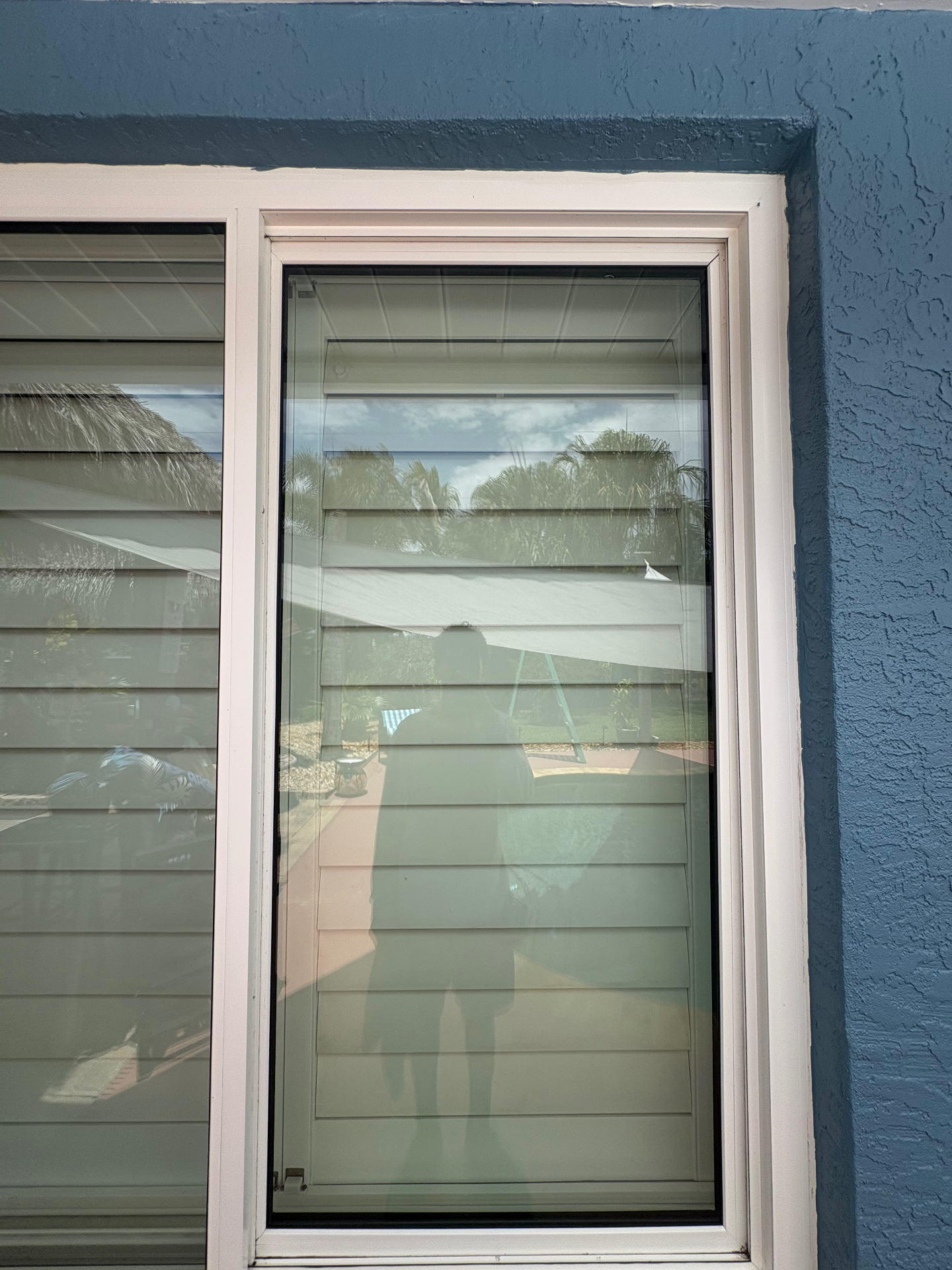 Clear window after professional cleaning by Pure Panes in Port St. Lucie