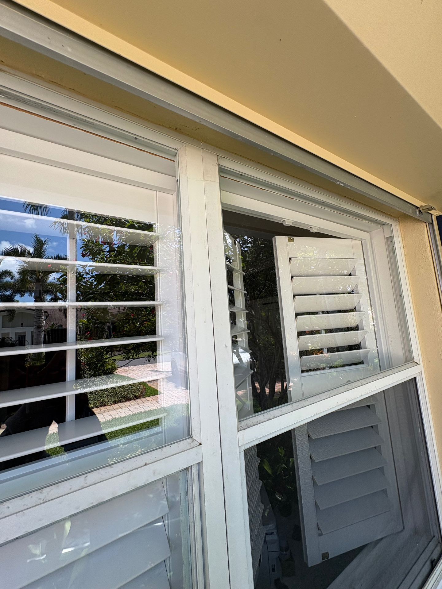 Detailed white window frames and shutters cleaned by Pure Panes